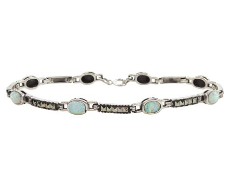 Silver opal and marcasite oval link bracelet, stamped 925 Condition Report:Length = 19.5cm, good condition 