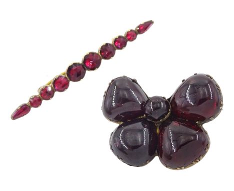 19th century gold foil backed, graduating rose cut garnet bar brooch and a cabochon cut garnet bow broochCondition Report:Gar