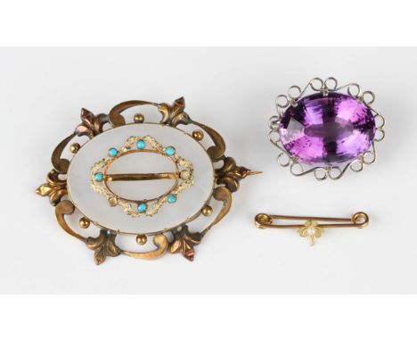 A Victorian chalcedony and turquoise oval brooch, width 6.1cm (the central locket compartment and two turquoises lacking), a 