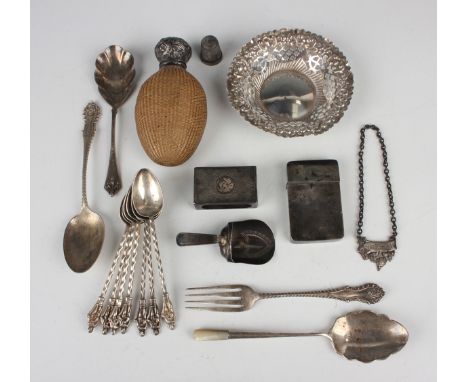 A George III silver caddy shovel, the bowl engraved with a shield shaped cartouche, Birmingham 1800 by IT, length 7cm, a smal