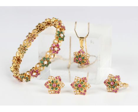 A gold, emerald, ruby and freshwater cultured pearl suite, comprising a hinged bangle on a snap clasp, unmarked, weight 28.9g