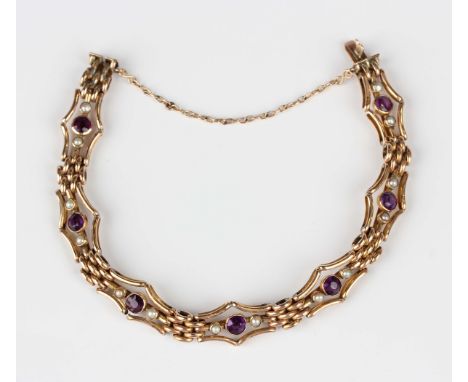 An Edwardian gold, amethyst and seed pearl bracelet in a curved bar and oval link design, on a snap clasp, detailed '9c', fit
