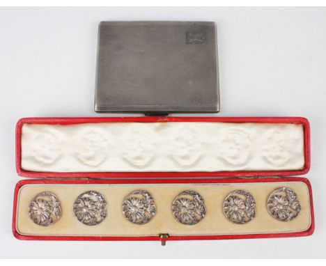 A set of six Edwardian silver circular buttons, each cast and pierced with a daisy and leaf stem, Chester 1903 by King &amp; 
