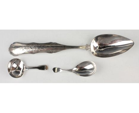 A Dutch silver serving spoon with engraved handle, weight 63.2g, length 28cm, together with two silver Fiddle pattern caddy s