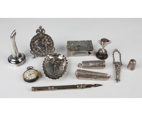 A small group of silver, including a watch holder stand, embossed with classical figures, Chester 1901 by George Nathan &amp;