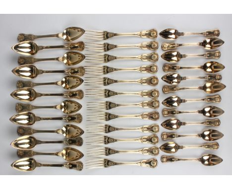 A set of twelve 19th century French silver gilt King's pattern dessert forks and spoons, maker's mark 'CMS', total weight 131