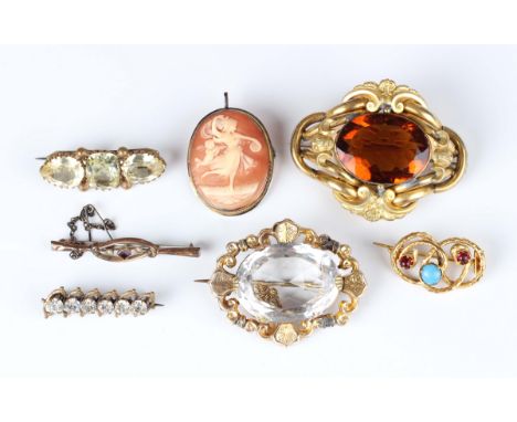 A Victorian gold and rock crystal single stone oval brooch, unmarked, weight 16.4g, width 4.6cm, a gold, seed pearl and mauve