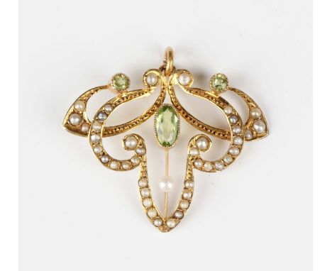 A gold, peridot and seed pearl pendant of scrolling form, circa 1900, centred by an oval cut peridot, otherwise set with two 