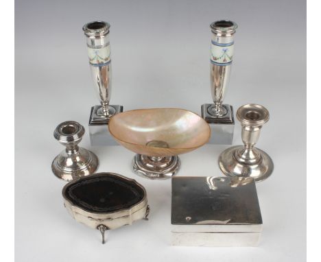 A pair of George V silver and enamelled specimen vases of elongated ovoid form, painted with a garland of roses and ribbon bo
