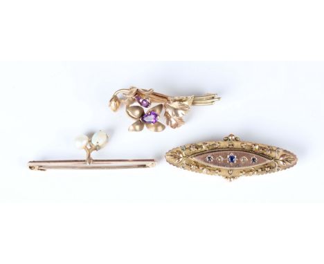 A late Victorian 9ct gold, rose cut diamond and blue gem set oval brooch with applied decoration, Chester 1899, width 4.6cm, 