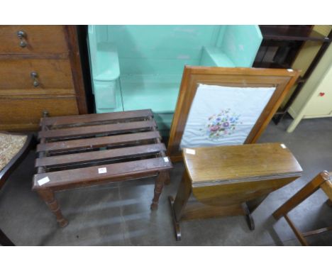 A mahogany luggage stand, a gateleg occasional table and an embroidered firescreen