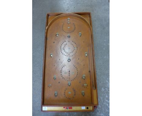 A Chad Valley bagatelle board