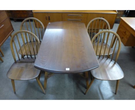 An Ercol drop-leaf table and four chairs