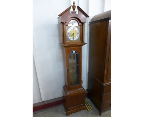 A mahogany triple weight longcase clock