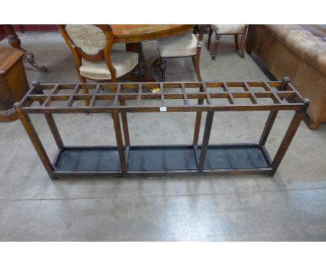 An early 20th Century oak stick stand