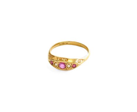 An 18 Carat Gold Ruby and Diamond Five Stone Ring, finger size SGross weight 3.6 grams.