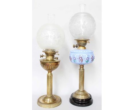 A Victorian Brass Based Oil Lamp, with fluted pedestal and opaque blur glass reservoir, together with a similar oil lamp (2)
