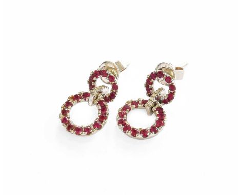 A Pair of 18 Carat White Gold Synthetic Ruby and White Stone Drop Earrings, designed as two conjoined circles, in claw settin