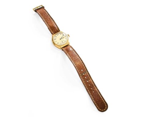 A 9 Carat Gold Tonneau Shaped Wristwatch, retailed by Collingwood, 1933, manual wound lever movement signed Tavannes Watch Co
