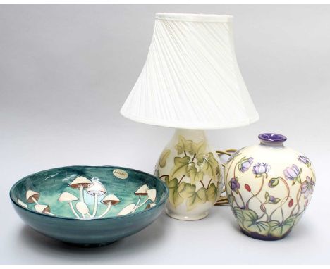 A Moorcroft Ivy Pattern Lamp, designed by Wendy Mason and Julie Dolan, on a white ground, impressed mark, 20cm high and two o