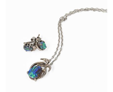 An Opal and Diamond Pendant on An 18 Carat White Gold Chain, pendant stamped '750', pendant length 1.6cm, chain length 40.5cm