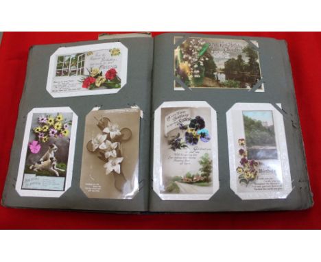 A postcard album, various cards and photographs, includes embroidered First World War cards