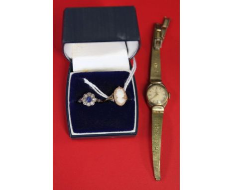 A 9ct gold cameo set ring, a 9ct gold stone set ring, and a gold plated ladies wristwatch (3)