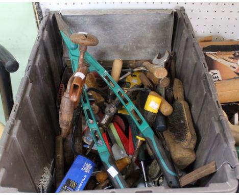 A large crate containing a good selection of hand tools