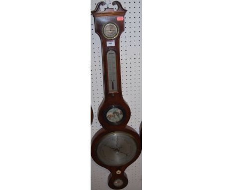 An early 19th century mahogany and satinwood strung five dial wheel barometer