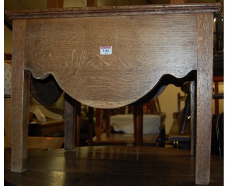 A modern hardwood and brass bound fixed butlers tray table; together with a 19th century oak hinge-top commode (2) 