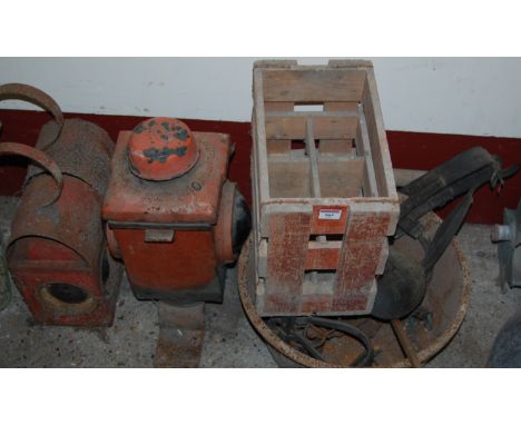 A red painted signal lamp, circa 1962, together with a pair of further signal lamps, a Hunter & Oliver Ltd of Bury St Edmunds