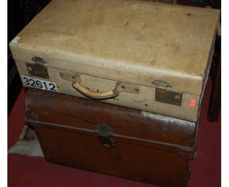 A metal hinge-top travelling trunk, with end carry handles and later stencil painted; together with a vellum suitcase (2) 