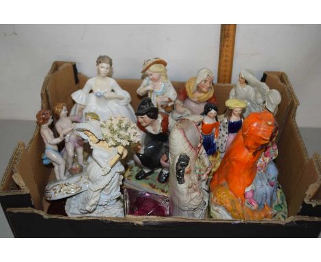 Quantity of assorted Staffordshire style figurines and a Royal Doulton model of a lady, HN3222