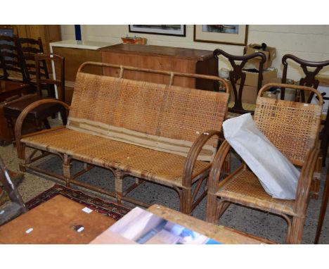 A vintage bamboo framed two seater sofa and accompanying armchair together with a folding dressing table mirror