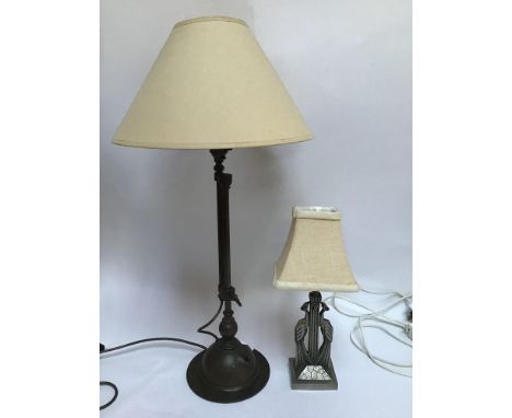 An arts and crafts style adjustable table lamp with hammered bronzed base, 45cm high, together with a French white metal tabl