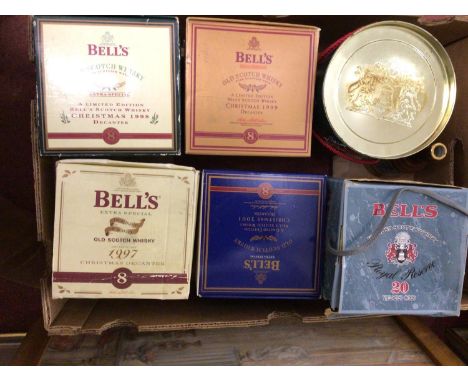 Six assorted unopened commemorative Bell's Extra Special, Old Scotch Whisky ceramic decanters, including five Christmas decan