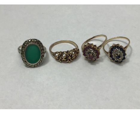 Three various 9ct gold rings including two set with emerald and ruby coloured stones with diamond chips, one with pierced scr