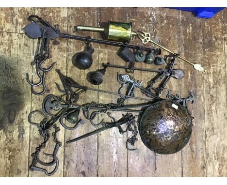 A brass cased clockwork spinning spit roaster, together with a brass toasting fork with boat finial and a collection of iron 