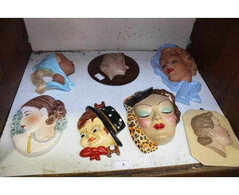 SECTION 8.  Seven various art deco 'style' pottery wall masks including a West German Cortendorf Rockabilly style lady with b