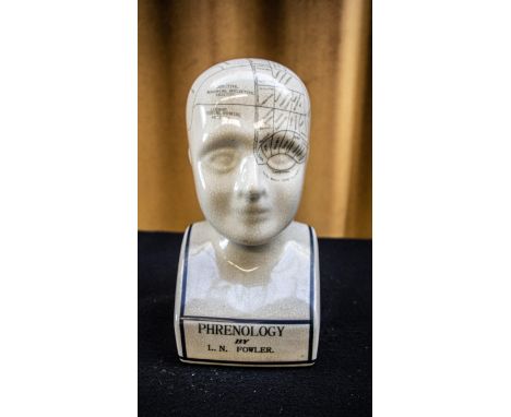 A ceramic Phrenology head by L.N. Fowler, 29cm tall 
