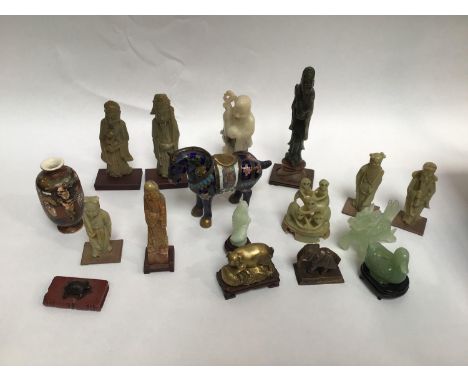 A cloisonné enamelled horse, together with some soapstone figures of Oriental gentlemen, some jade coloured figures of animal