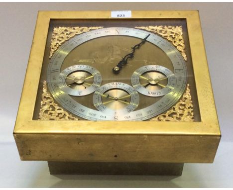 An unusual electric-operated nautical navigational / meteorological  display clock, with 10-inch square brass dial, large sil