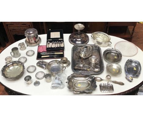 A large quantity of silver-plated items including trays, teapot, coffee cups, ice bucket, glass and silver-plated coasters an