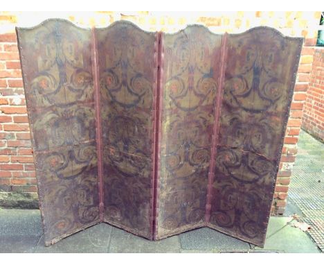 A Victorian four-fold dressing screen covered with arabesque-embossed leather, (AF) 216x192cm, together with a wall clock wit