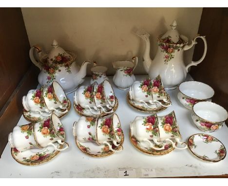 SECTIONS 1 &amp; 2. A 49-piece Royal Albert 'Old Country Roses' pattern part tea and dinner service comprising dinner plates,