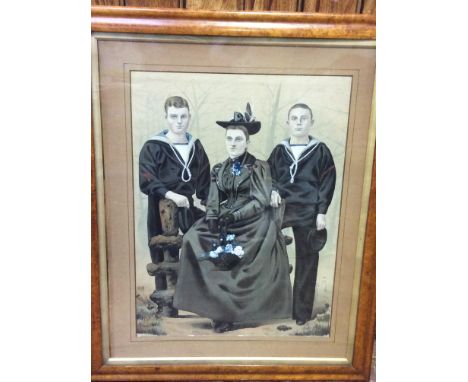 An early 20th century 'China Trade' portrait of a lady wearing Victorian style dress and hat, seated on rustic fence, flanked