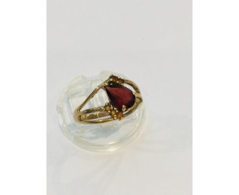 A 9ct yellow gold dress ring, set with a large opaque ruby in a four claw setting, ring weighs 5.8 grams, finger size N. Toge