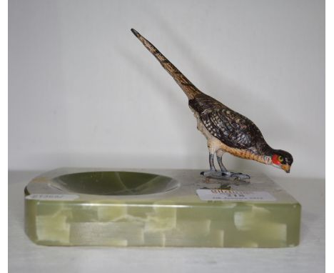 Austrian cold painted bronze Pheasant, stamped Austria, mounted on an onyx ashtray, length 14cm.