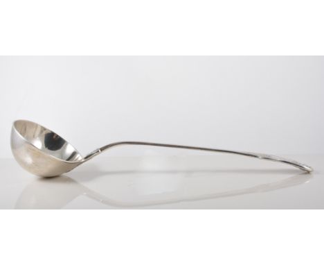 A George IV silver soup ladle, by Richard Pearce, London 1822, Kings pattern, engraved crest, 9oz, 35cm.