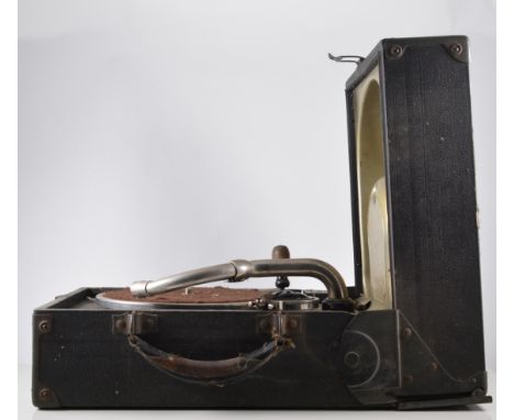 A Decca portable gramophone, black cloth case, depth 36cm, a collection of 78rpm records and a Corona silent portable typewri